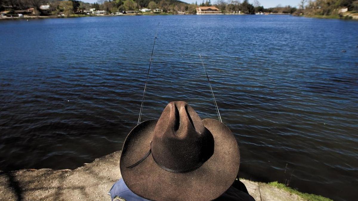 Dick Davis enjoys a sunny Sunday afternoon fishing at Atascadero Lake in a 2010 photo. Davis, a lifelong Atascadero resident, said he remembers water skiing on the lake in his younger years.