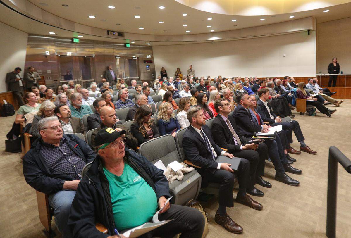 Attendees listen to a meeting of the Nuclear Regulatory Commission at the Board of Supervisors chambers in San Luis Obispo on May 3, 2023.