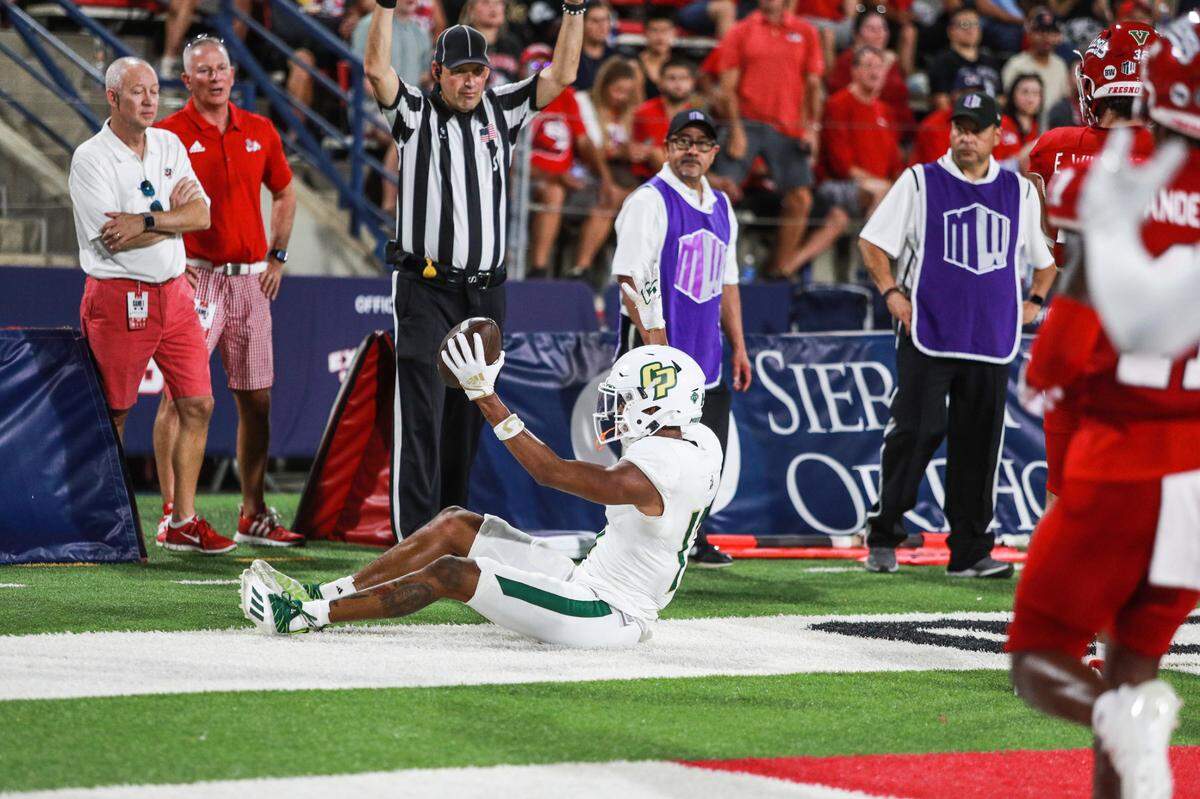 Bryson Allen scores the Mustangs’ lone touchdown during Cal Poly’s 35-7 loss to Fresno State on Thursday, Sept. 1, 2022.