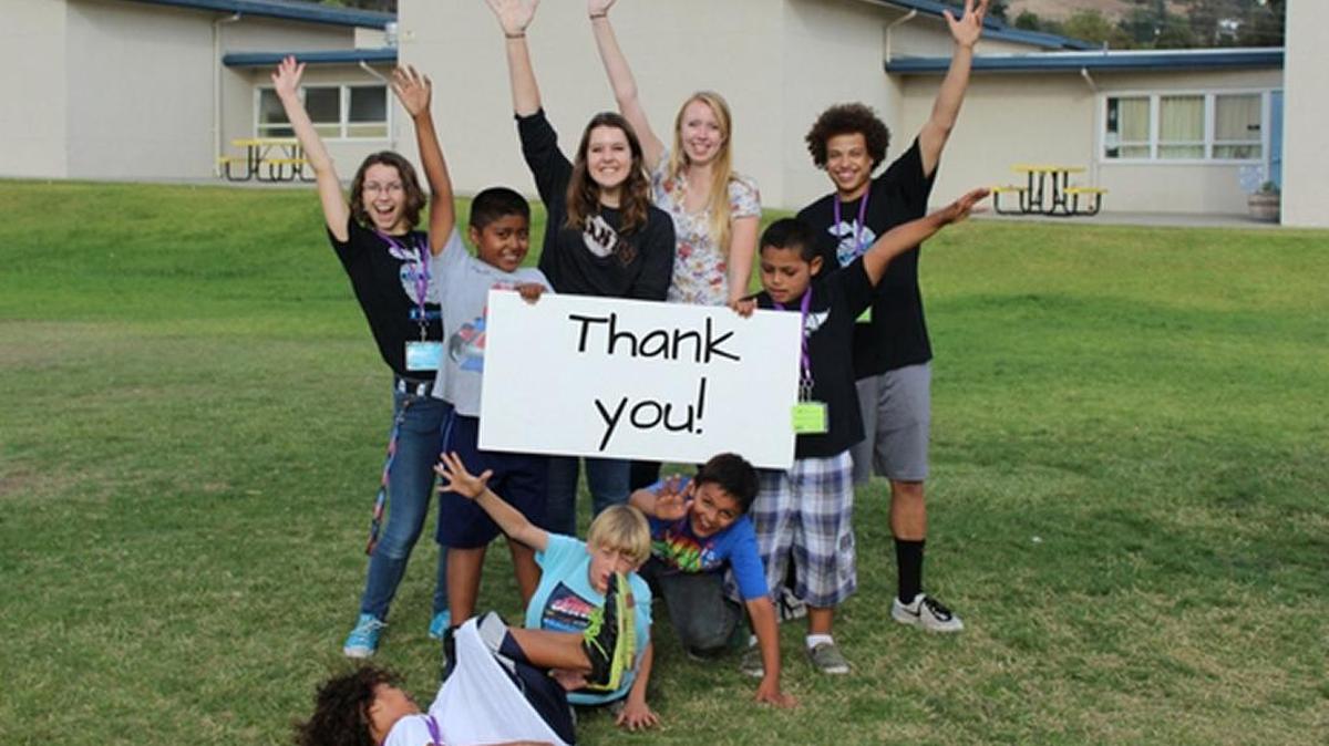 Kids and high school students in Big Brothers Big Sisters’ school-based program thank the community for their continued support.