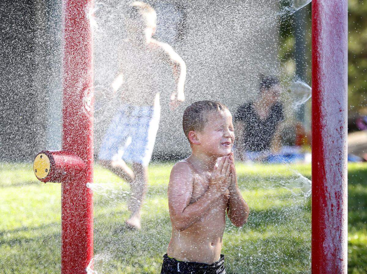 Wyatt Parker enjoys the water play structure Heilmann Regional Park in Atascadero in June 2017.