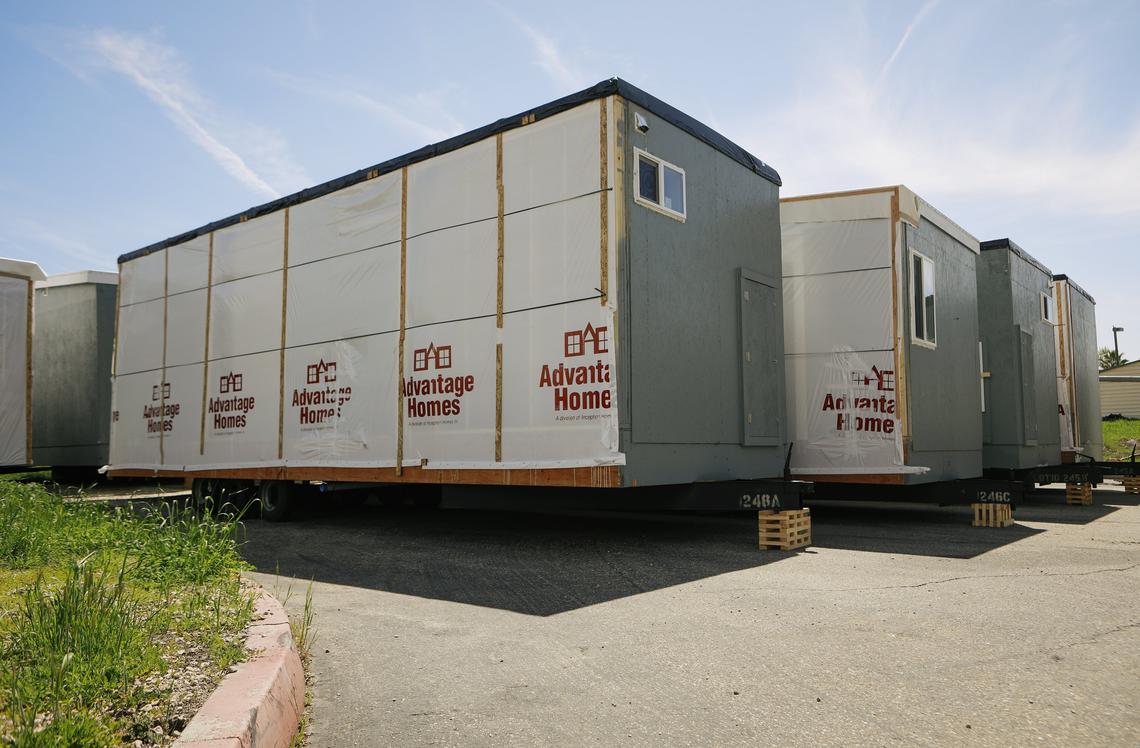 These modular units, being stored behind the The Tribune offices off Higuera Street, are part of a housing project at 546 Higuera St. in downtown San Luis Obispo.