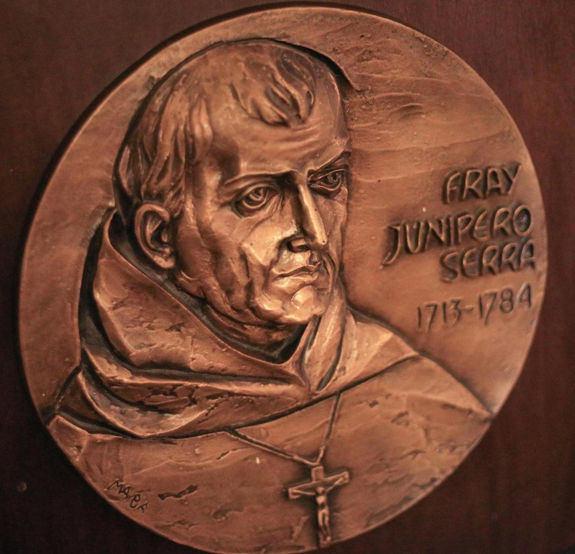 A medallion in the Mission museum shows founder Franciscan missionary Junipero Serra.