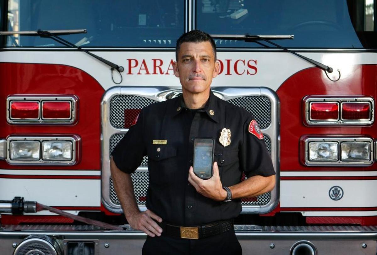 San Luis Obispo fire Chief Garret Olson shows off the PulsePoint app, which the city uses to help save lives by quickly alerting CPR-trained volunteers when there’s someone nearby who needs help.
