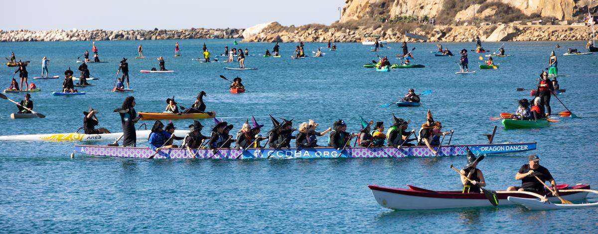 Hundreds of people turned out for the 10th annual Witches and Warlocks Paddle in Morro Bay on Oct. 29, 2023.