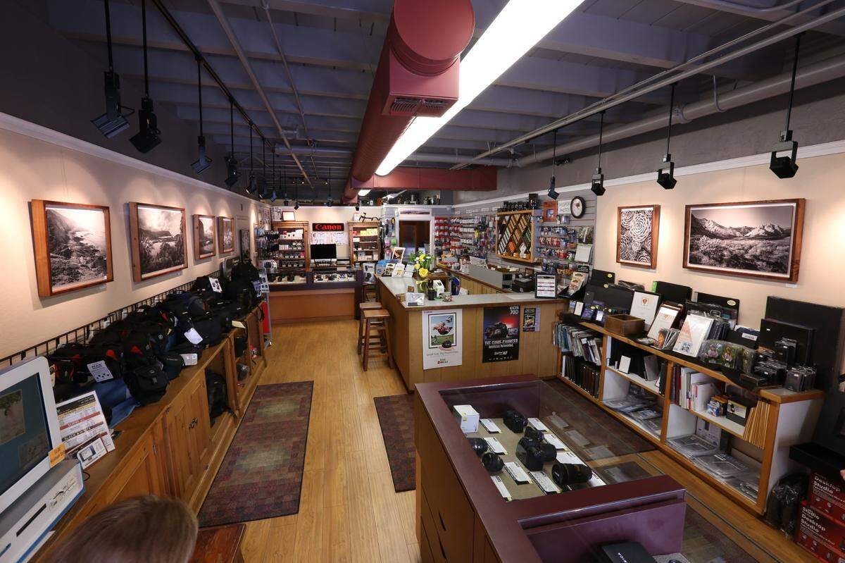The Photo Shop in downtown San Luis Obispo celebrated its 30th anniversary on July 15, 2025. Owner Peggy Mesler said she believes it “is the only camera store from Monterey to Bakersfield to Ventura.” Here,, photos in one of the shop’s frequent exhibits grace the walls.