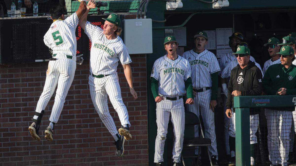 Alejandro Garza, left, celebrates the first of two home runs in Cal Poly’s 14-9 Big West baseball win over Riverside at Baggett Stadium on May 15, 2025.