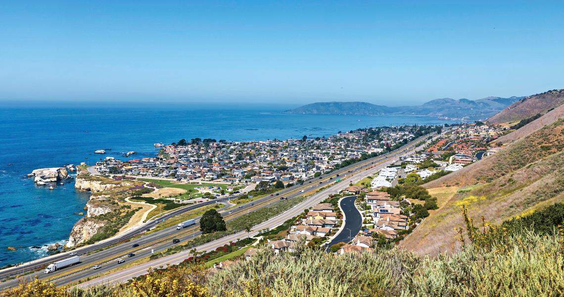 Highway 101 runs through Pismo Beach past Dinosaur Caves Park.