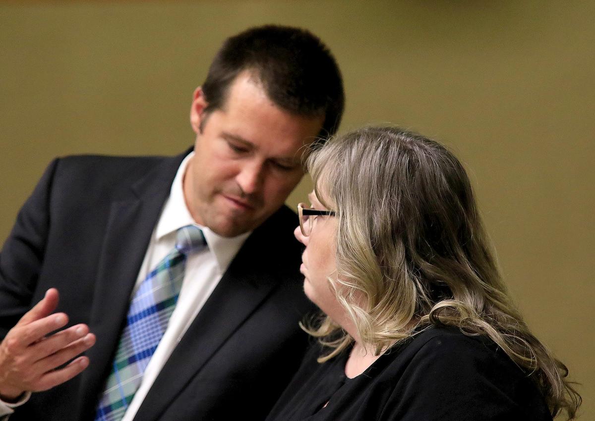 Claire Eastin was accused of embezzling in 2018 more than $200,000 from Life Community Church in Paso Robles, where she was an office manager. Eastin confers with public defender Brian Buckley during her court hearing.