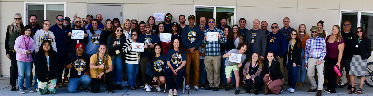 Arroyo Grande High School coach Phillip Reid is expected to run in the USA Olympic Marathon Team Trials in Orlando on Feb. 3, 2024. To help wish him good luck, Arroyo Grande High School staff bought “Team Reid” merchandise and gathered to cheer him before he left for the race.