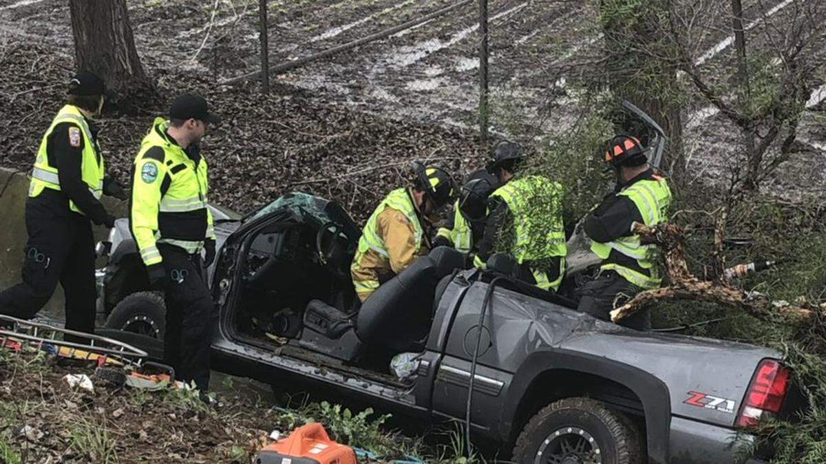 Five Cities Fire Authority officials respond to a collision involving a vehicle and a tree on southbound Highway 101 at the Grand Avenue on-ramp in Arroyo Grande.