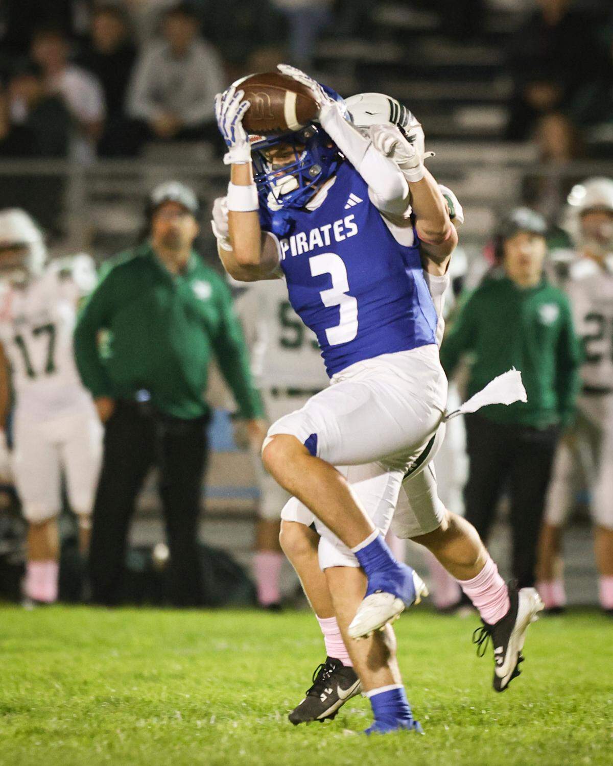John Myers makes a catch defended by Levi Goodman. Templeton beat Morro Bay 41-30 in a football game Oct. 11, 2024.