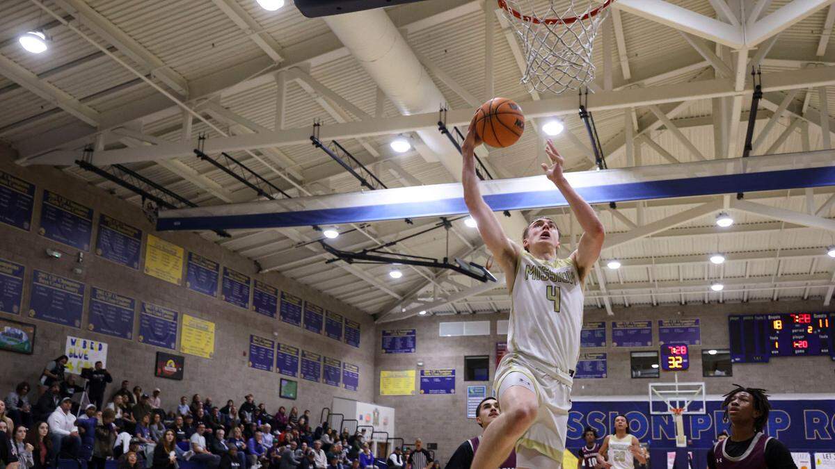 Luke Jacobson goes up for a dunk. Mission Prep won 62-51 over Independence basketball playoff Feb. 15, 2024.