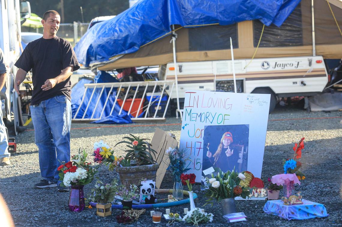 Nicholas Watson speaks at a memorial for Jorji Coy-Epperly on Feb. 16, 2022, a day after her death in an RV fire at the Safe Parking area on Kansas Avenue.