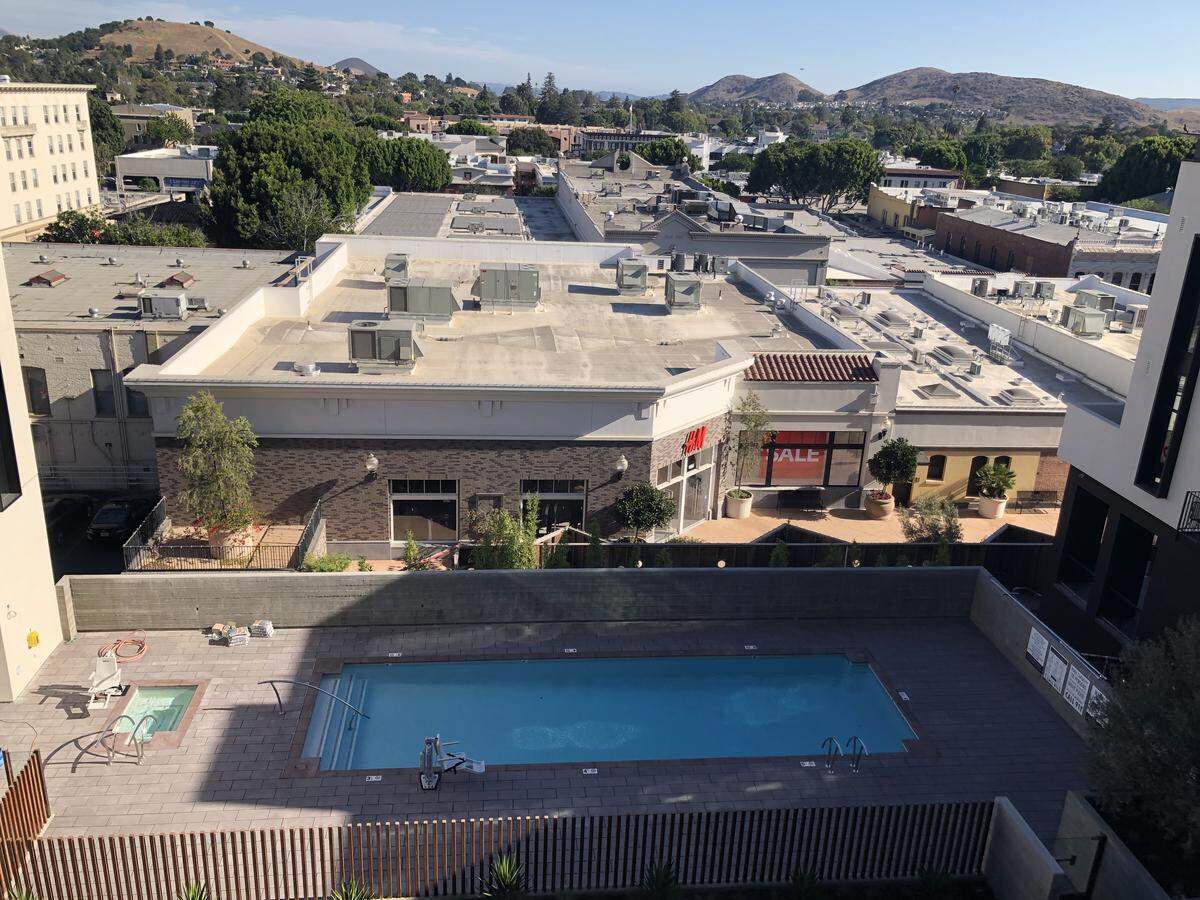 A view of the pool and mountains from atop Hotel SLO.