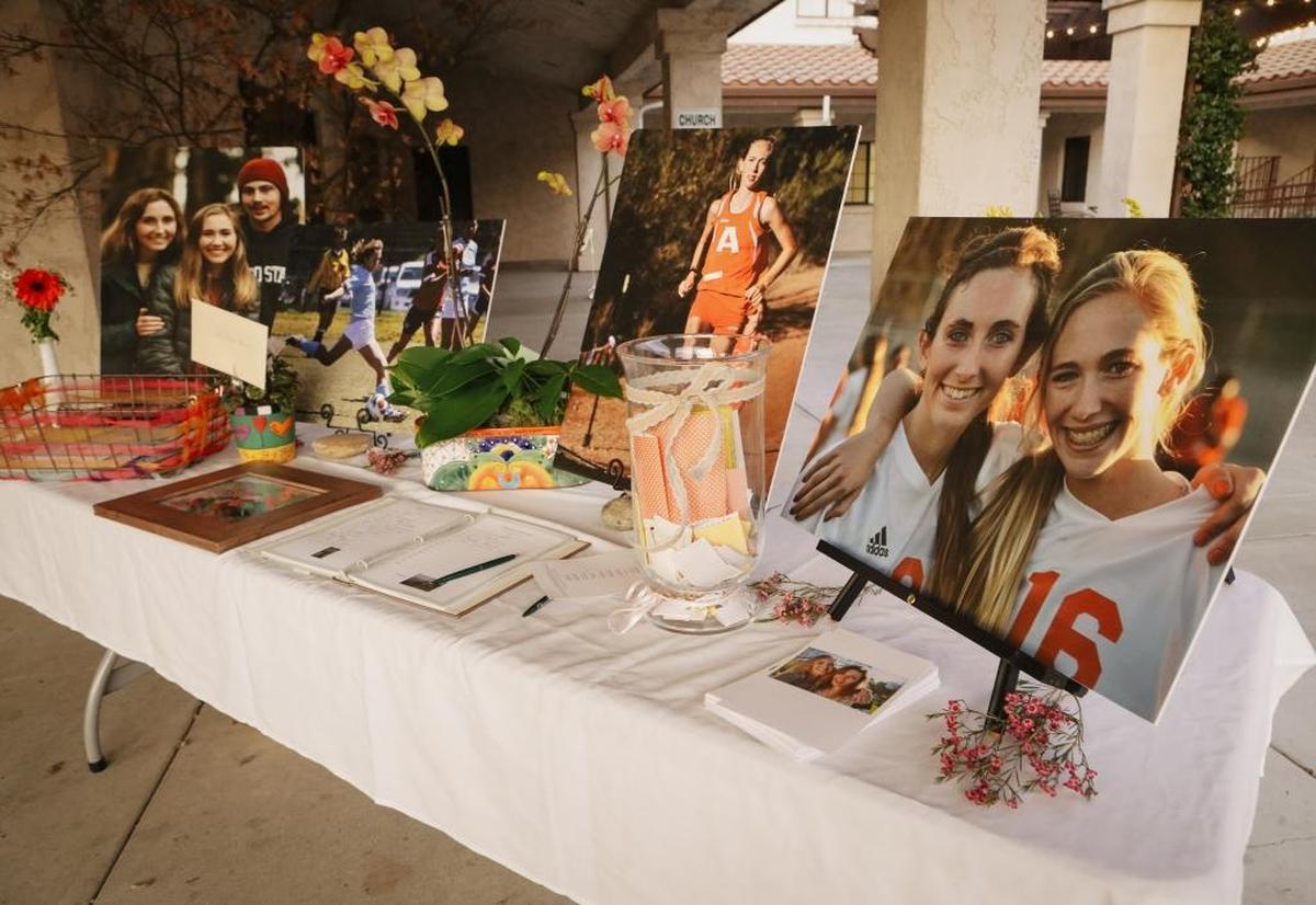 Photos of Brynn and Brittni Frace fill a table at the sisters’ celebration of life Friday at Atascadero Bible Church.