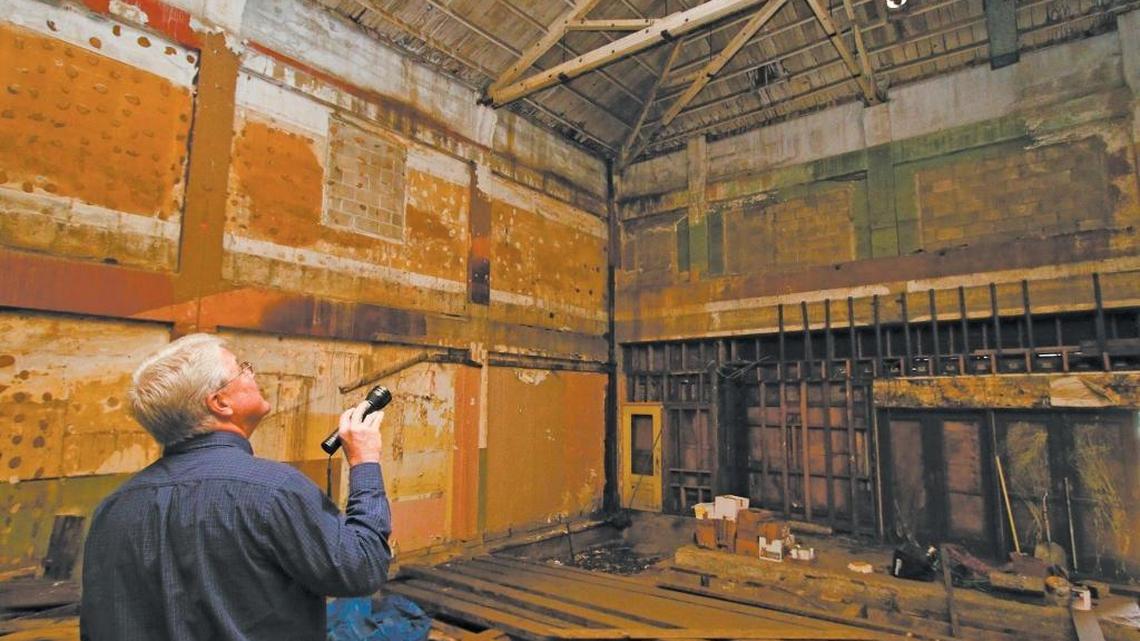 Keith Gilliss, real estate broker, leads a tour of the Fox Theater in Paso Robles in 2015. The owners of Re:Find Distillery, who bought the property last year, now want to turn it into a concert venue with a small brewery and tasting room.