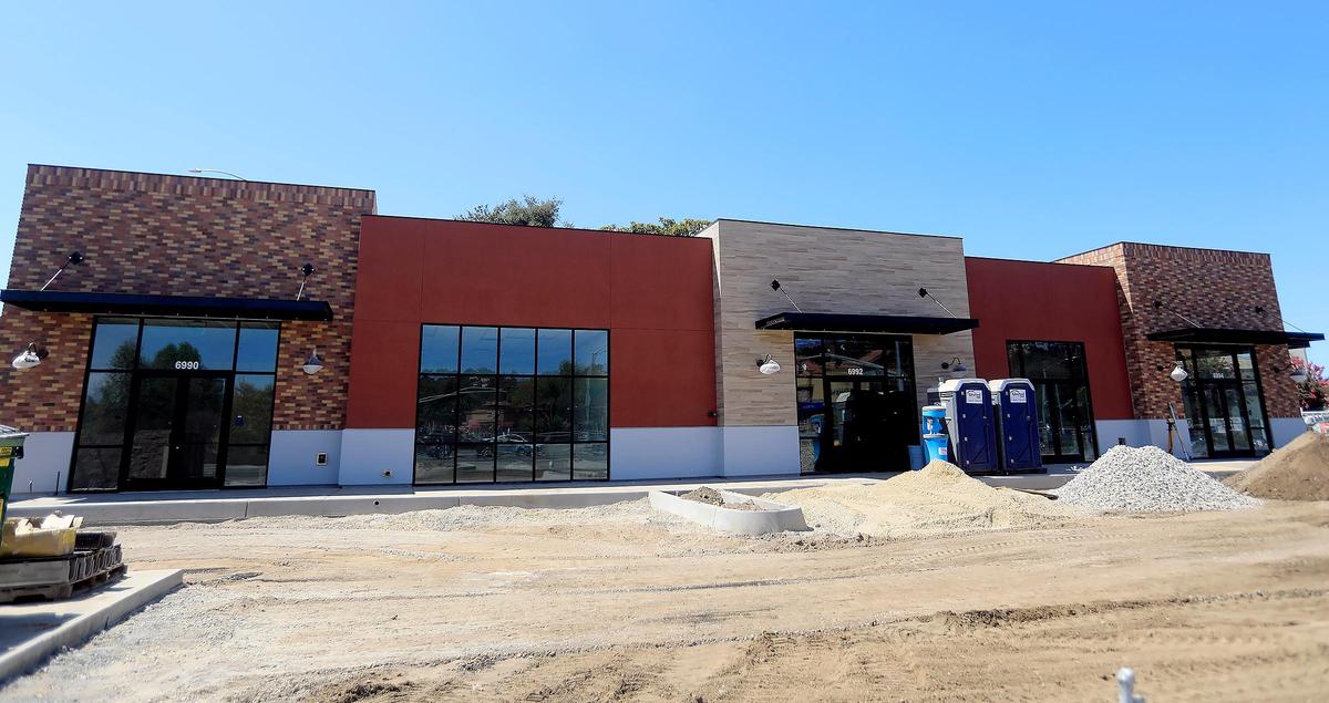 A new three-business development at the intersection of El Camino Real and Highway 41 will be home to a Jamba Juice, an Auntie Anne’s pretzel shop and an AT&T store.