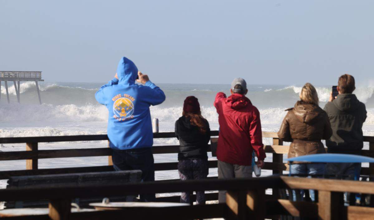 Big waves broke shortly after high tide at Pismo Beach as surfers and spectators came to take a look after a big storm passed through Jan. 5, 2023.
