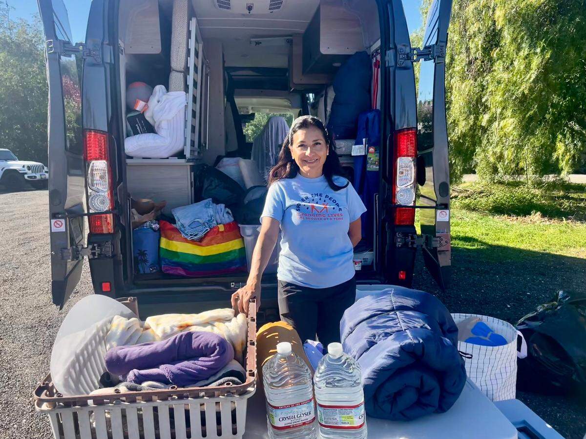 Del Owen, of San Luis Obispo, gathers donations for people displaced by the devastating fires raging in Southern California in January 2025.
