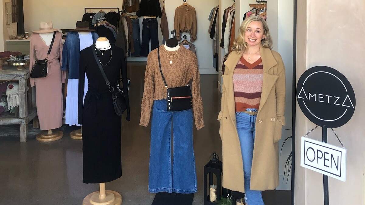 Erica Garate of Atascadero poses in front of her new women’s clothing boutique, Ametza. The store opened at La Plaza in Atascadero in October 2022.
