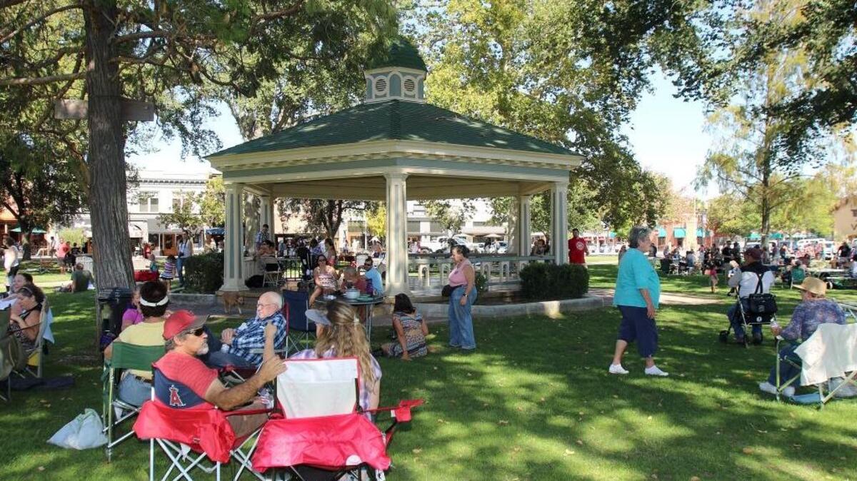Paso Robles residents celebrate Pioneer Day in Downtown City Park in this file photo. Visitors soon must pay to park throughout the downtown area.