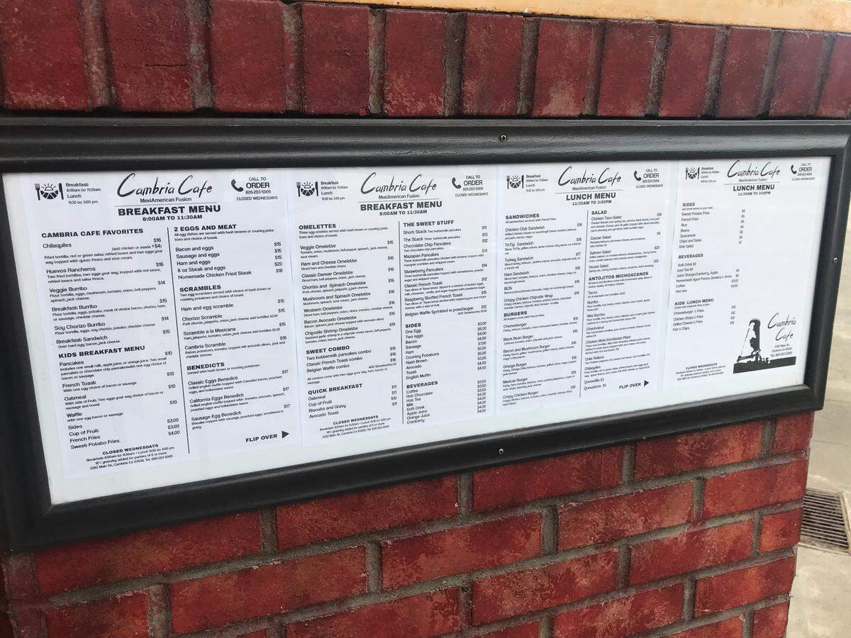 People passing by the Cambria Cafe, recently reopened in late January, 2025, can preview the breakfast and lunch menus posted below the eatery’s exhibition window.