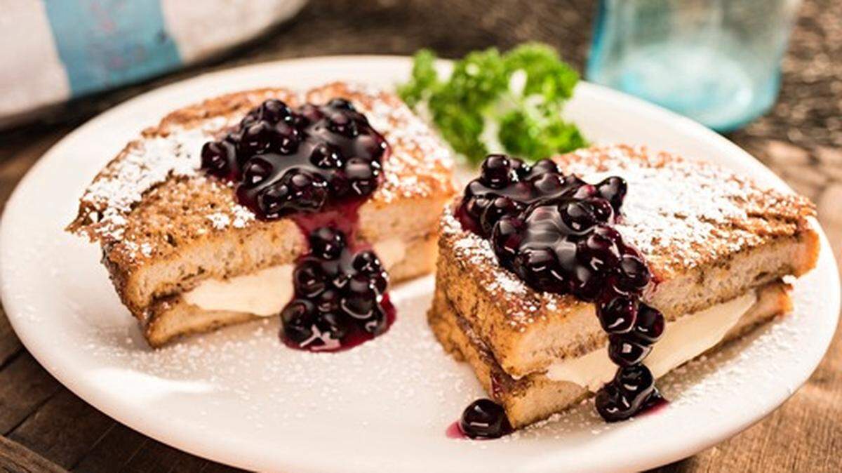 Stuffed French toast at Huckleberry’s breakfast and lunch restaurants is filled with sweet vanilla cream and served with fruit topping, such as this huckleberry compote.