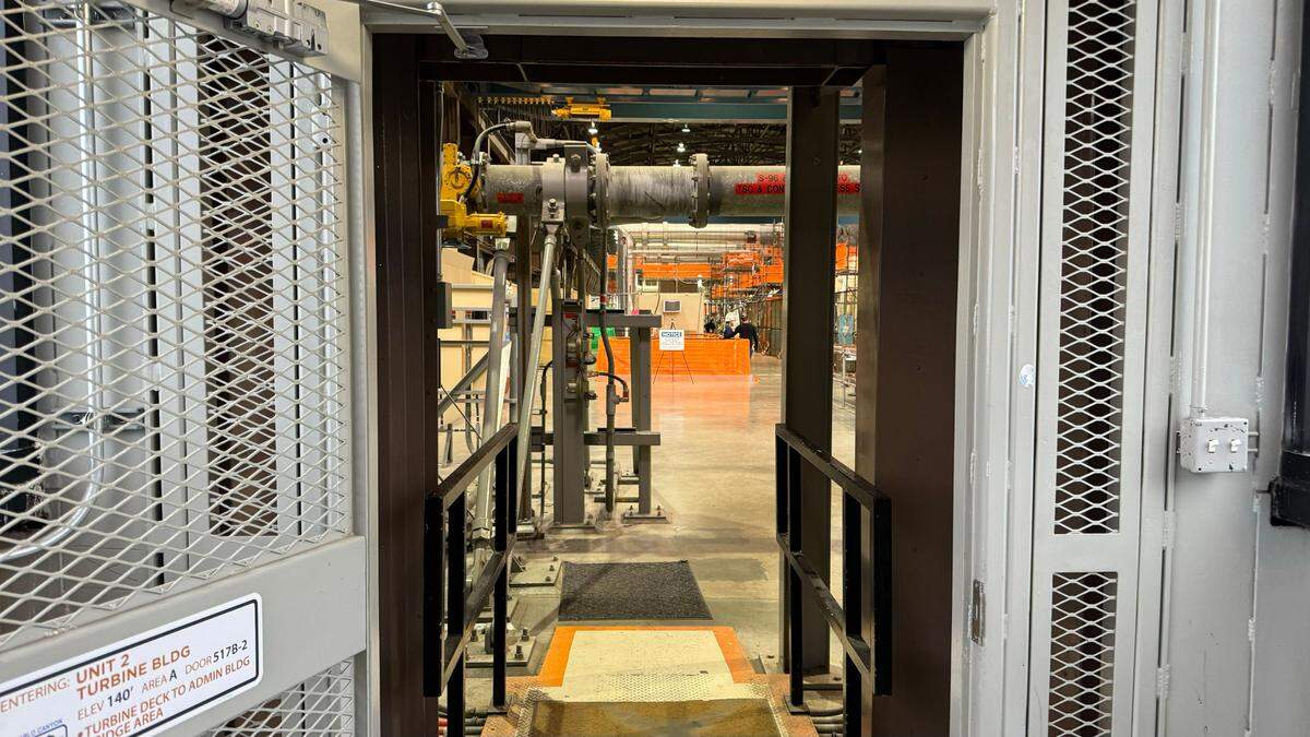 A door opens into the turbine building at Diablo Canyon nuclear power plant.