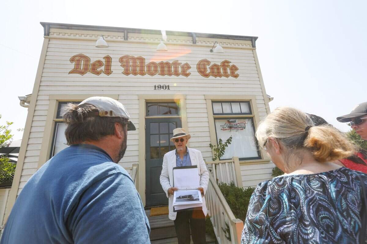 James Papp leads a Secret San Luis Obispo walking tour. This tour featured the railroad district. David Middlecamp 8-11-2018