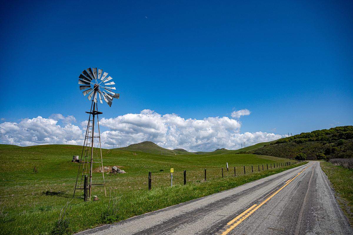 Cotton ball clouds blow over Turri Road in Los Osos on April 3, 2025.