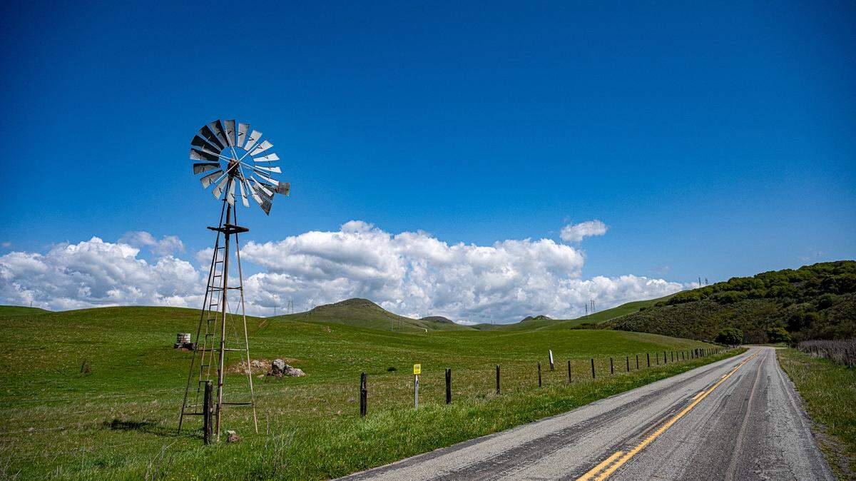 Cotton ball clouds blow over Turri Road in Los Osos on April 3, 2025.