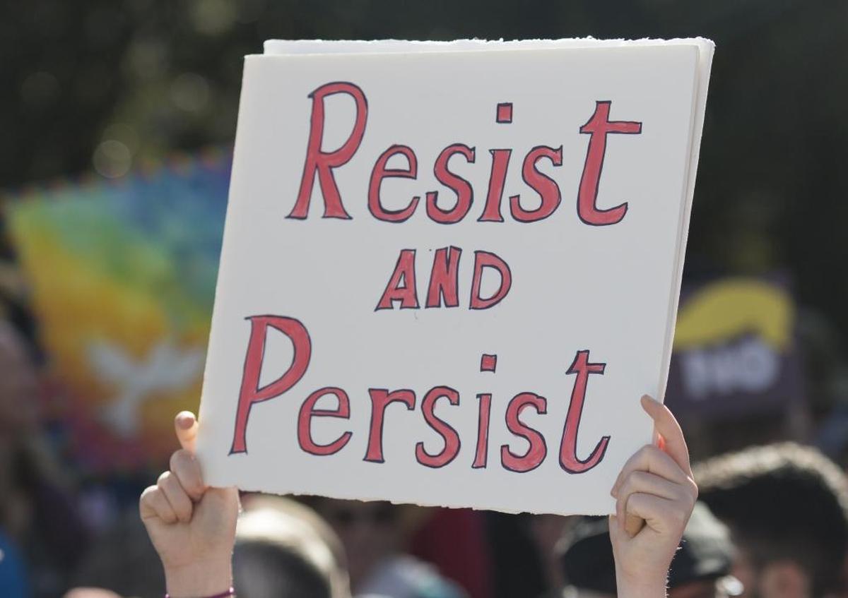 Signs from Saturday’s “Hear Our Vote: Voices of Resistance Rally.”