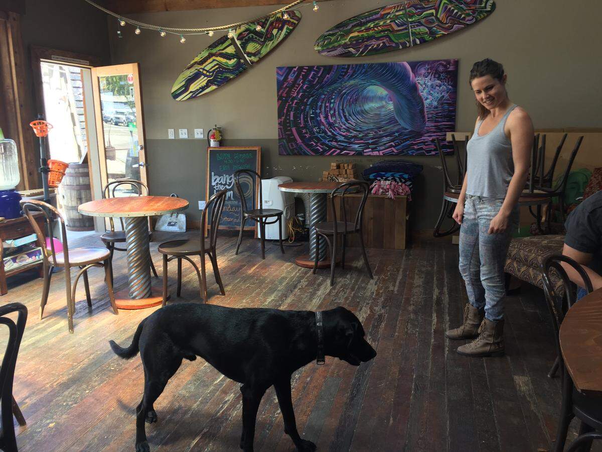 Owner Noelle DuBois, here with her dog, Porter, needs to find a new home for Bang the Drum Brewery.