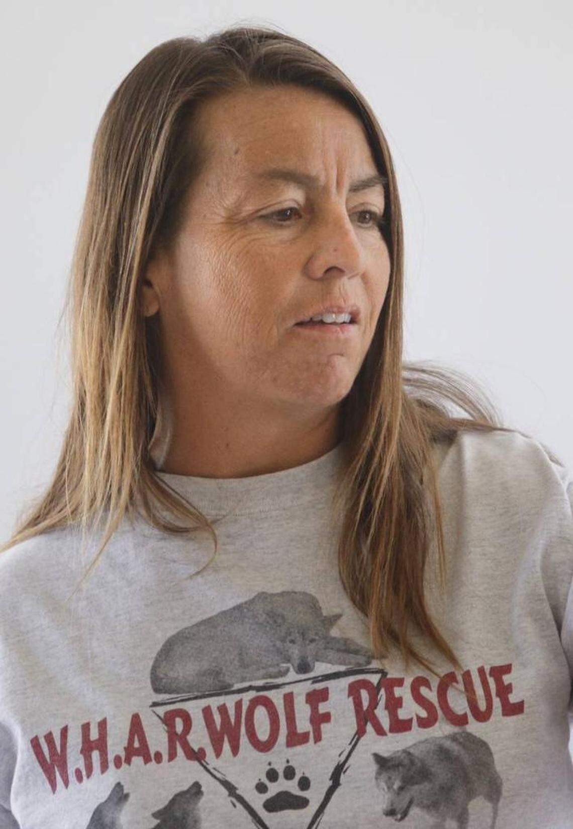 Kristi Krutsinger, co-founder and CEO of WHAR Wolf Rescue, gives a presentation at a library program at the San Miguel Community Center in 2015. Krutsinger was attacked by one of the rescue's wolves on June 22, 2018.