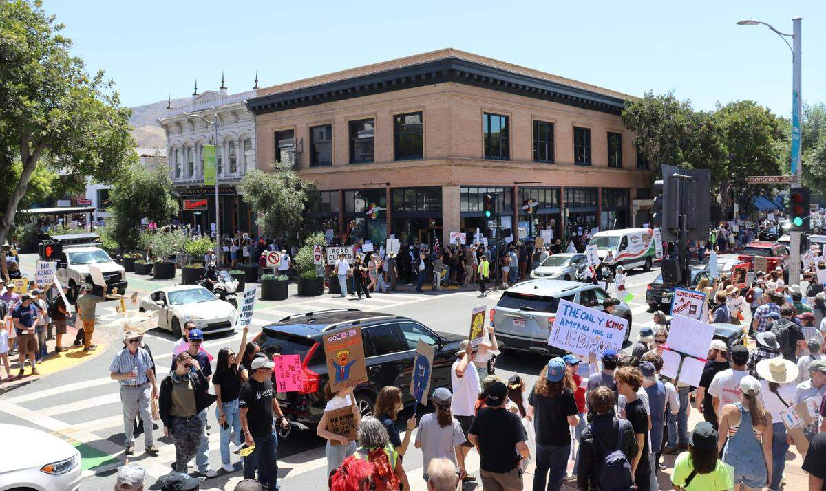 Thousands gathered in San Luis Obispo, California, for No Kings Day to protest executive overreach by the Trump administration on the President’s birthday.