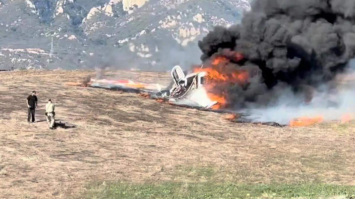 Two people were injured after a small plane crashed into a field and caught fire near Highway 101 in Goleta Wednesday afternoon, Jan. 29, 2025.