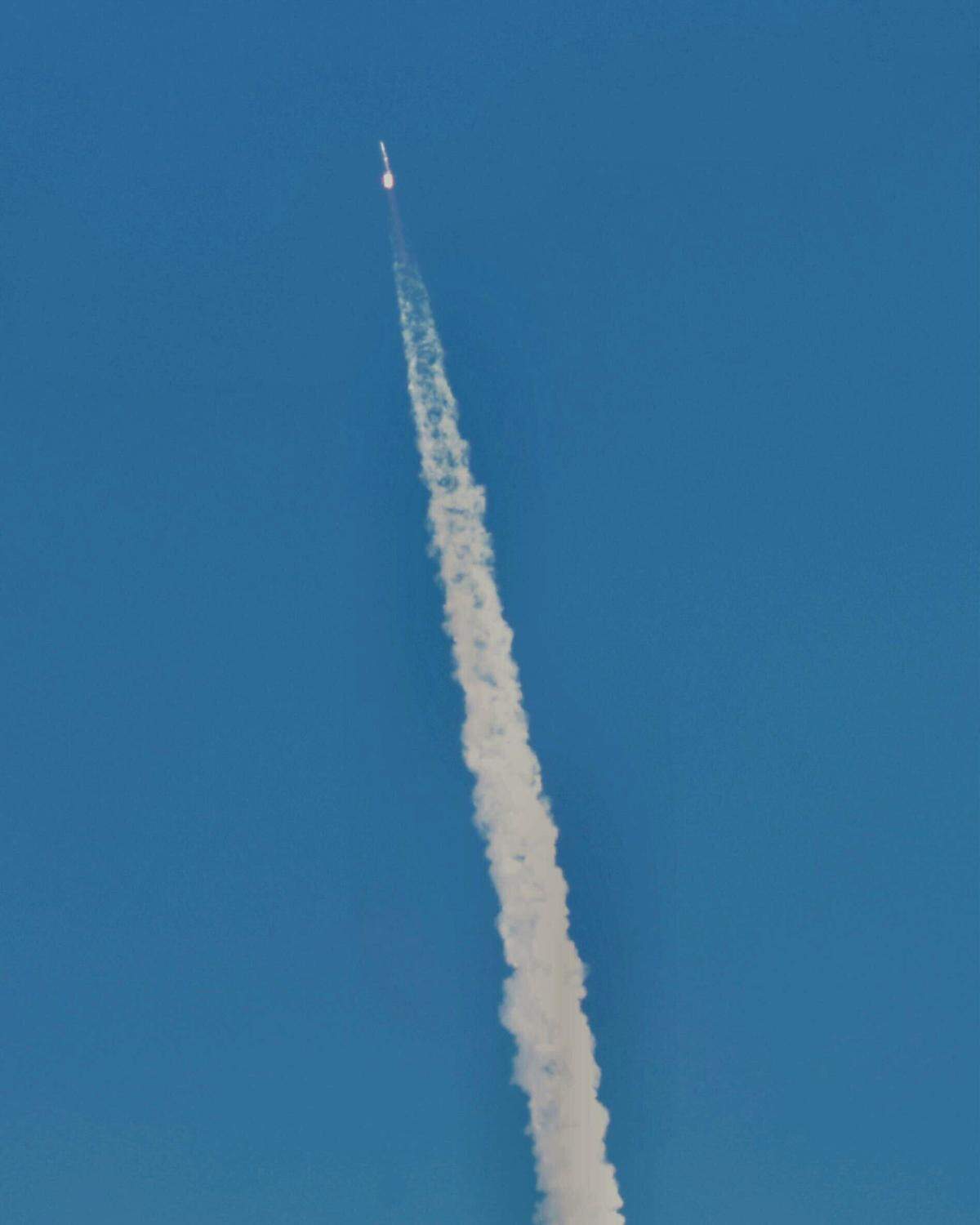 The last Delta IV Heavy rocket soars through a blue sky with a plume of white smoke trailing behind in a view from San Luis Obispo, after lifting off from Vandenberg Space Force Base at 3:25 p.m. on Saturday, Sept. 24, 2022.