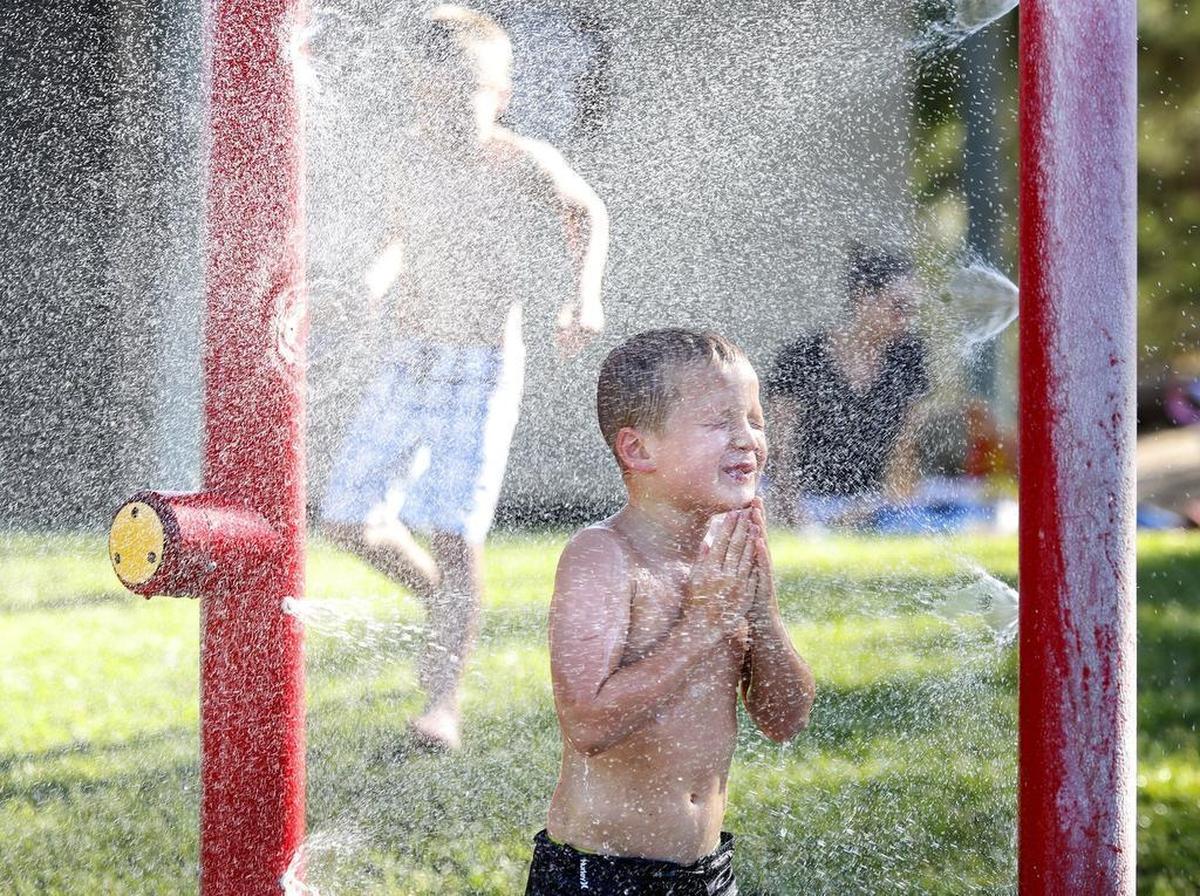 JUNE: Wyatt Parker, 6, enjoys the water play structure at Heilmann Regional Park in Atascadero on June 15, 2017.