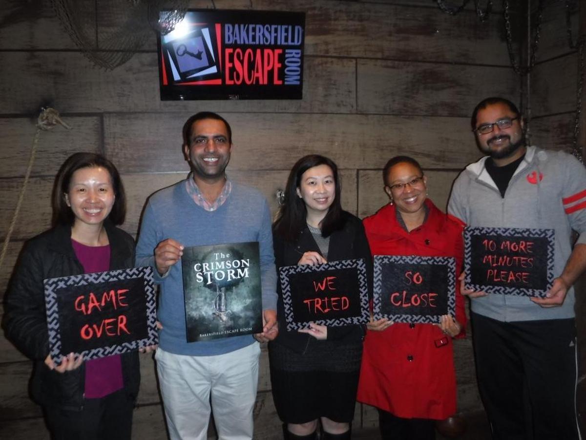 Participants share their results after experiencing the Bakersfield Escape Room.