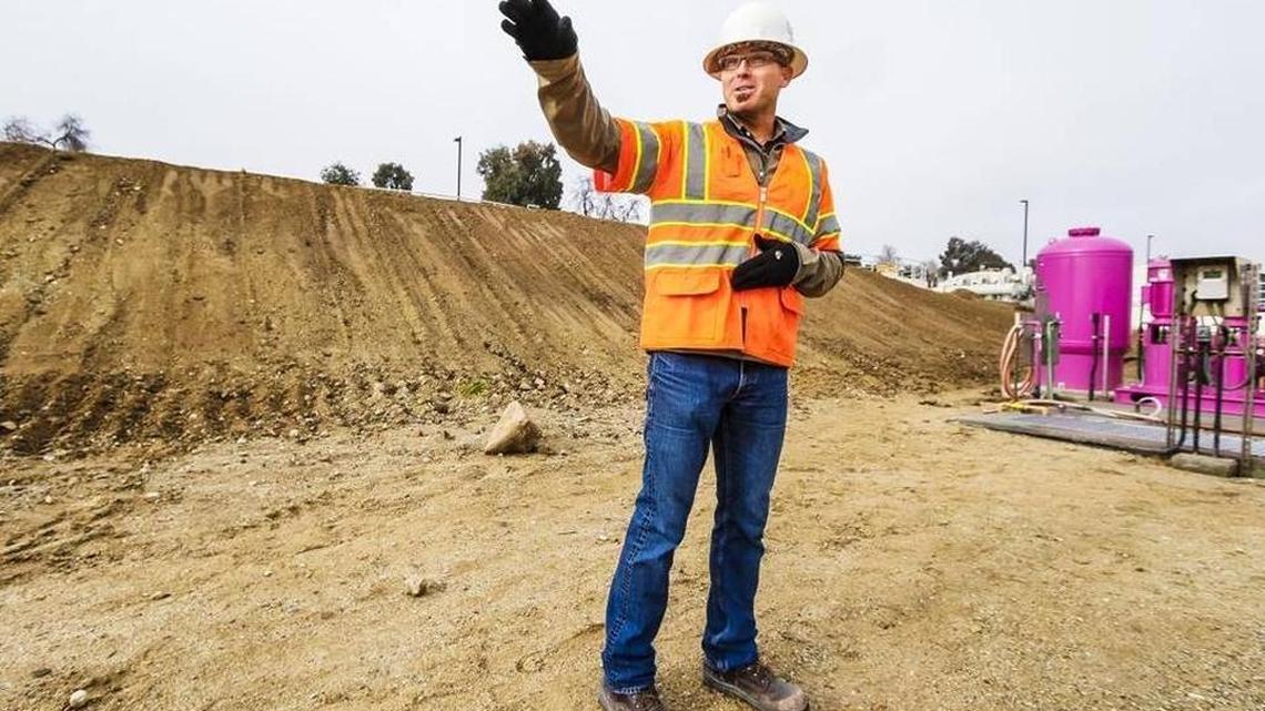 Paso Robles wastewater manager Matt Thompson stands in an area planned to house parts of a $18 million tertiary sewage treatment plant during a tour in December 2015.
