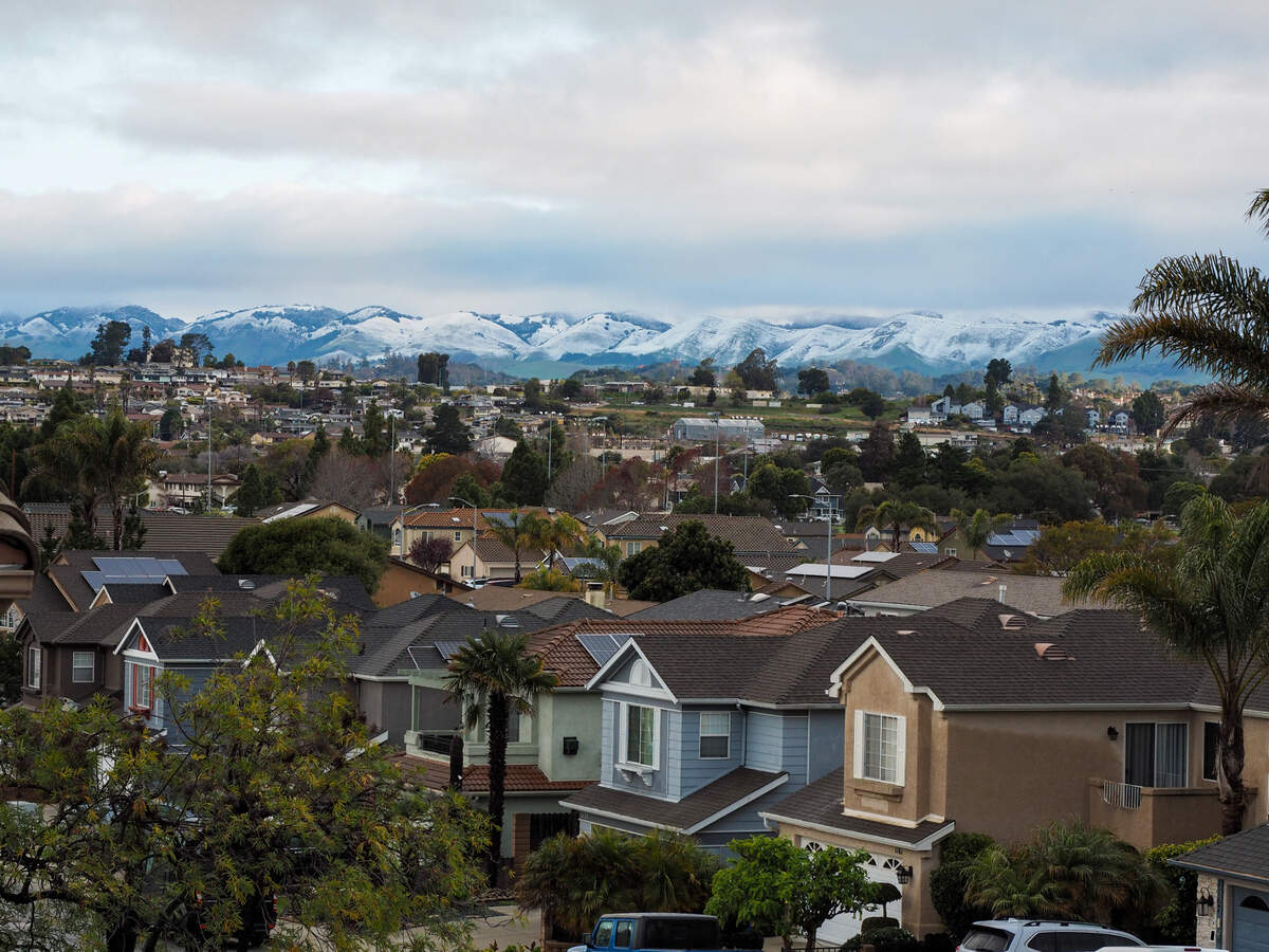 Snow dusts the hills in south San Luis Obispo County in a view from Grover Beach on Saturday, Feb. 25, 2023.