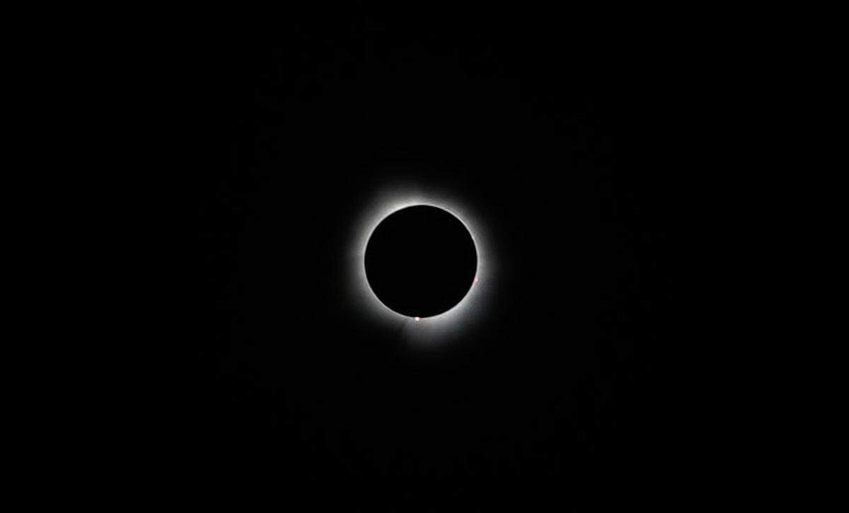 Tribune reporter John Lynch was in central Indiana in the path of the totality for the solar eclipse on April 8, 2024, and captured the the moon fully blocking the sun.