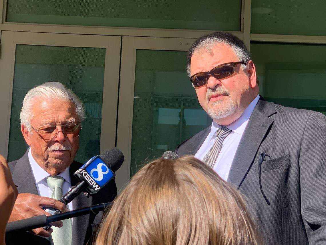 Ruben Flores, Paul Flores’ father, and his attorney Harold Mesick talk to the media after Ruben Flores was found not guilty of being an accessory after the fact in the Kristin Smart murder trial, outside the Monterey County Courthouse in Salinas, on Tuesday, Oct. 18, 2022. Paul Flores was found guilty of first-degree murder.