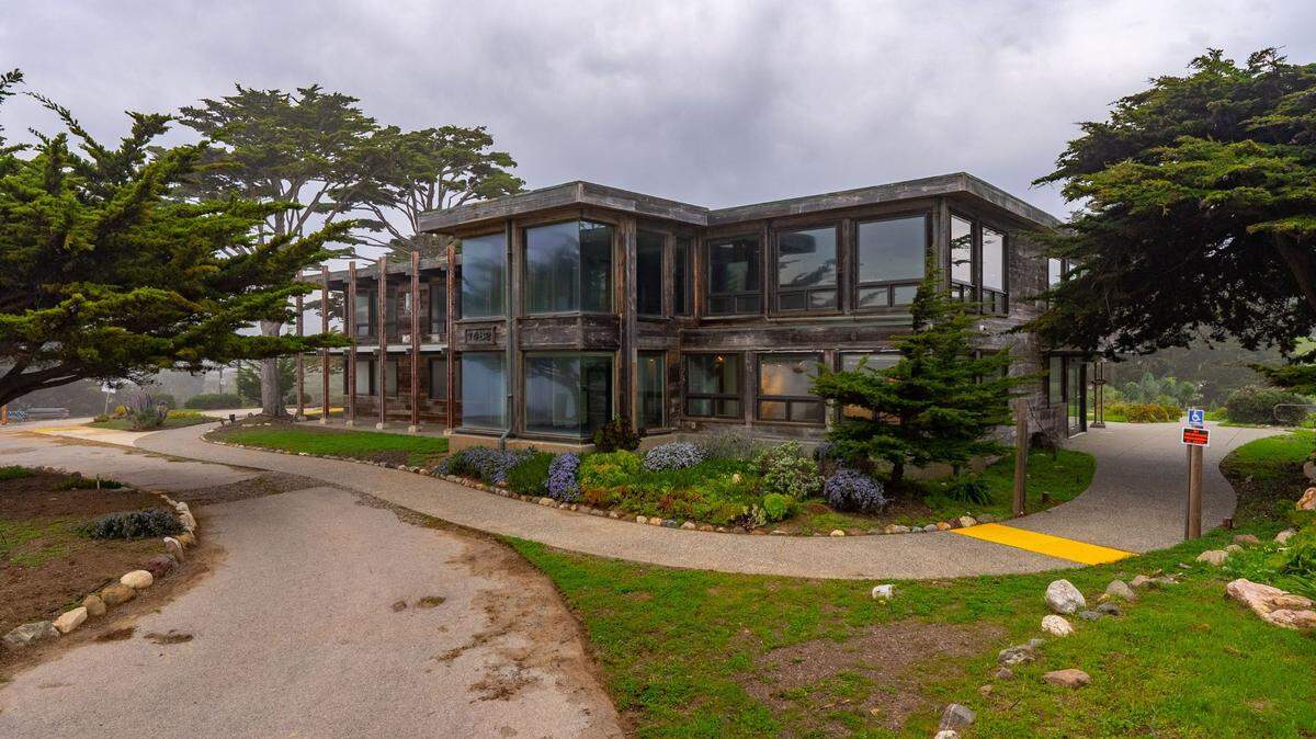 A curving driveway leads up the hill from Highway 1 to the large restaurant building on the Daou Ocean property in Cambria. For three decades, it was known as The Hamlet at Moonstone Gardens. The parcel was listed for sale for $5.5 million in late April 2025.