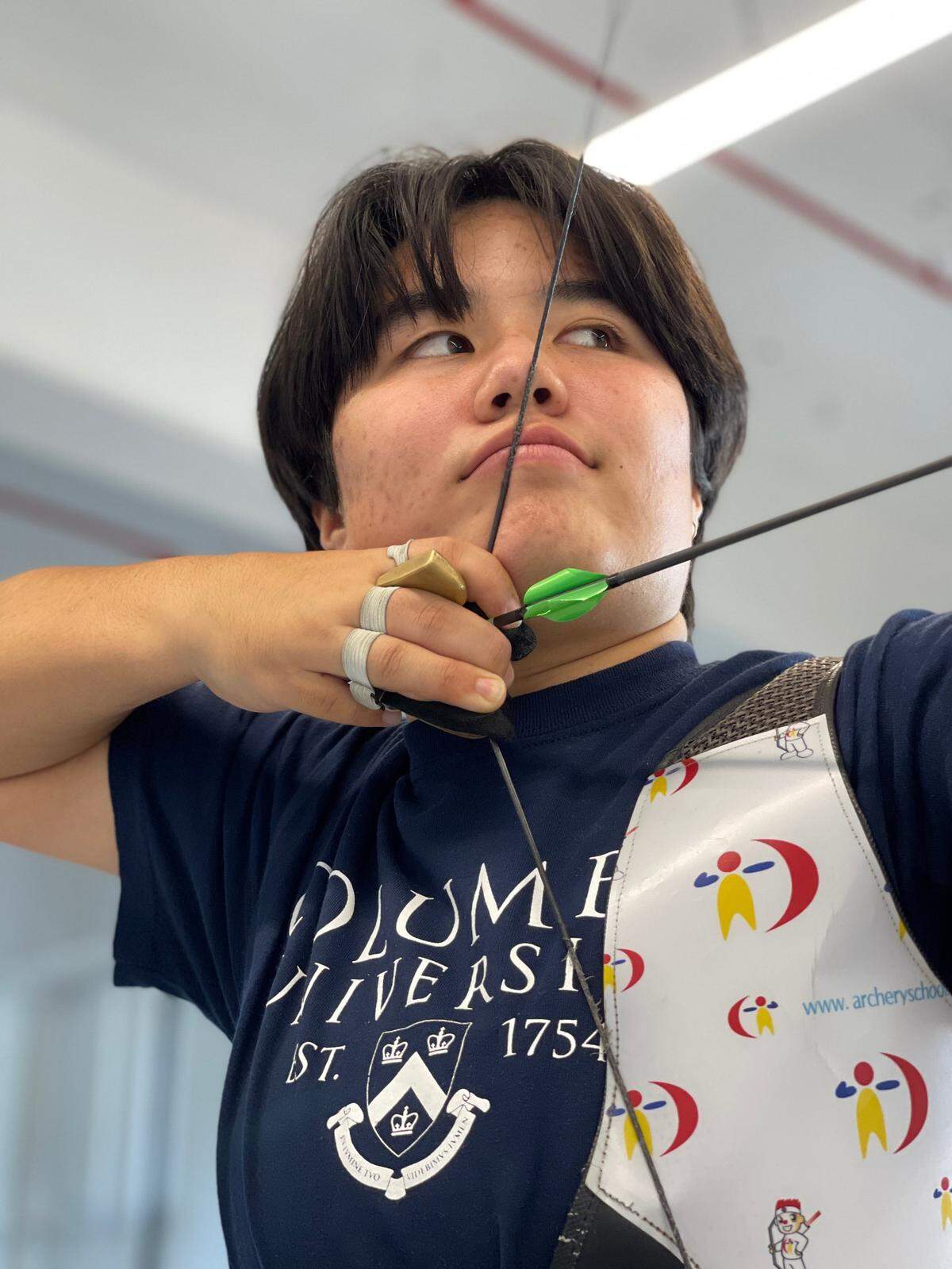 Judith Gottlieb prepares to shoot an arrow. The San Luis Obispo native attends Barnard College at Columbia University, where she competes on the archery team. She was ranked the ninth-best recurve archer in the United States (among those 14 through 17) before heading off to college.