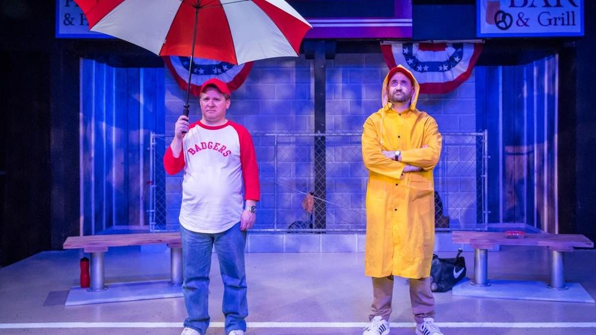 Michael (Timothy J. Cox) and Don (Travis Mitchell) wait out a rain delay in “Rounding Third,” playing Friday through Nov. 19 at San Luis Obispo Repertory Theatre.