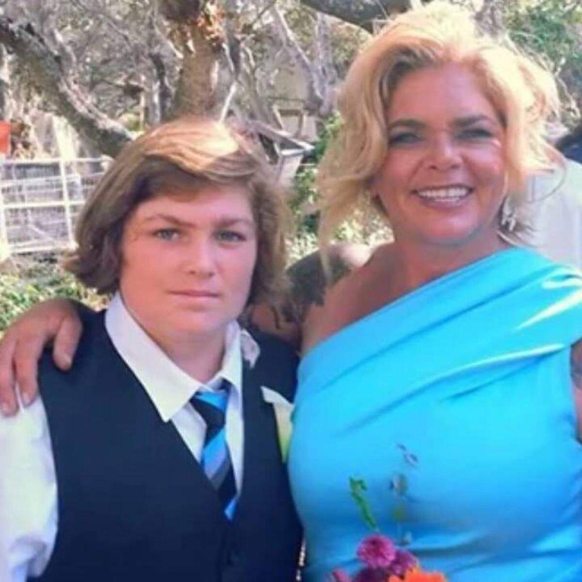 Justin West poses with his mother, Johanna Sanders in 2014.
