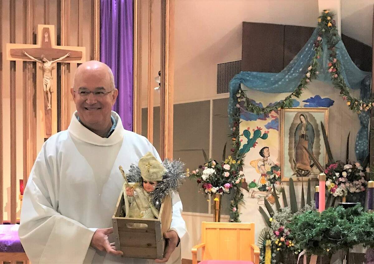 The Rev. Mark Stetz, pastor of Cambria’s Santa Rosa Catholic Church, died Sunday, March 13, leaving a parish and communities in mourning. Kathy Preciado’s December 2019 photo shows the pastor with a doll that she believes was supposed to represent the pope.