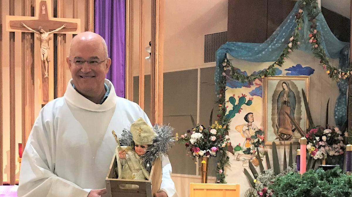 The Rev. Mark Stetz, pastor of Cambria’s Santa Rosa Catholic Church, died Sunday, March 13, leaving a parish and communities in mourning. Kathy Preciado’s December 2019 photo shows the pastor with a doll that she believes was supposed to represent the pope.